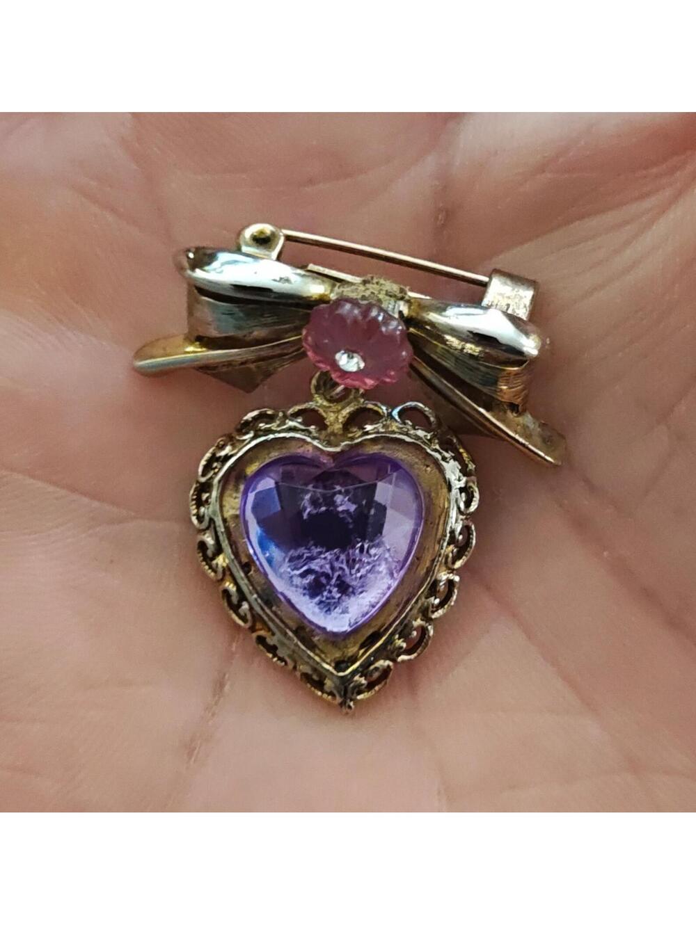 1980s Gold Tone Bow With Pink Flower & Filigree Edged Purple Stone Heart Brooch